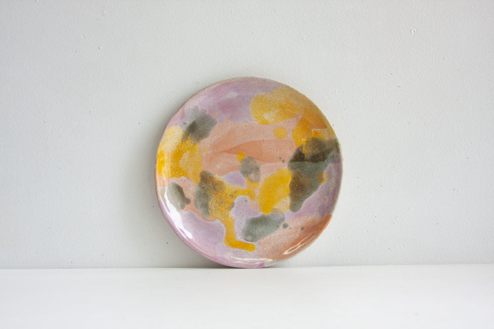 handmade ceramic purple, peach, yellow and blue side plate