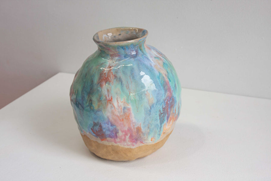 handmade ceramic large vase glazed in pink, blue, orange, green and white.
