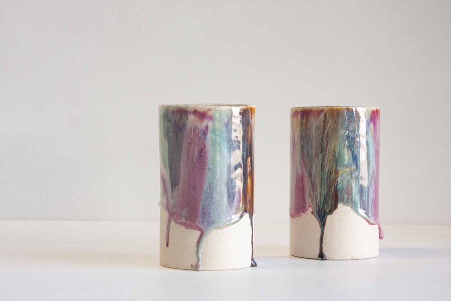 handmade ceramic vase glazed in purple, blue, brown and white.