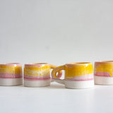 handmade ceramic pink and yellow mug