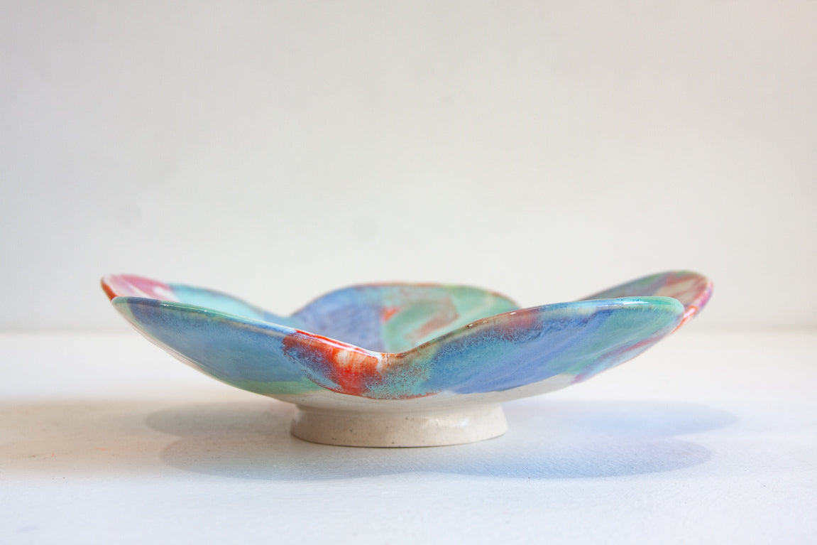 handmade ceramic pink, green, blue and green footed flower shaped bowl