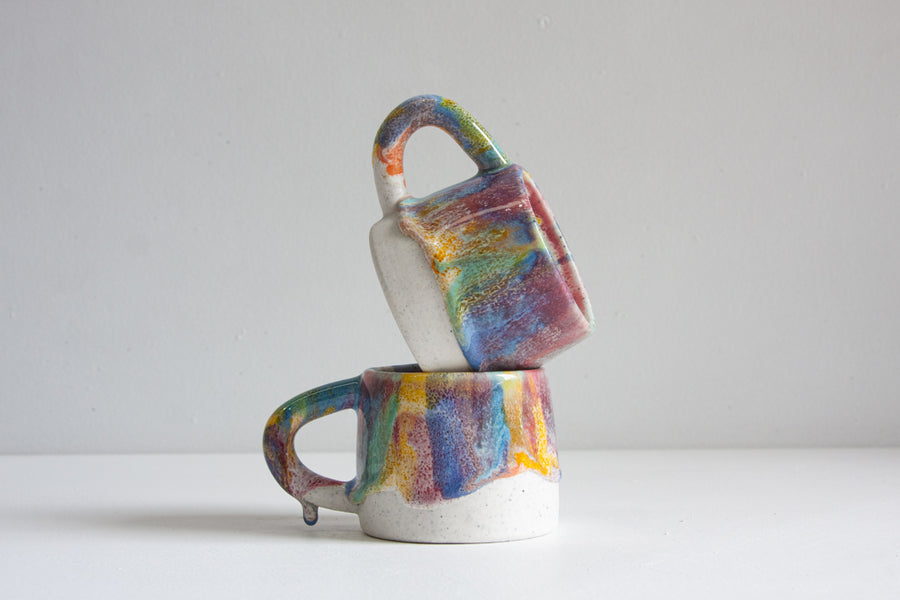 handmade ceramic pink, green and yellow mug
