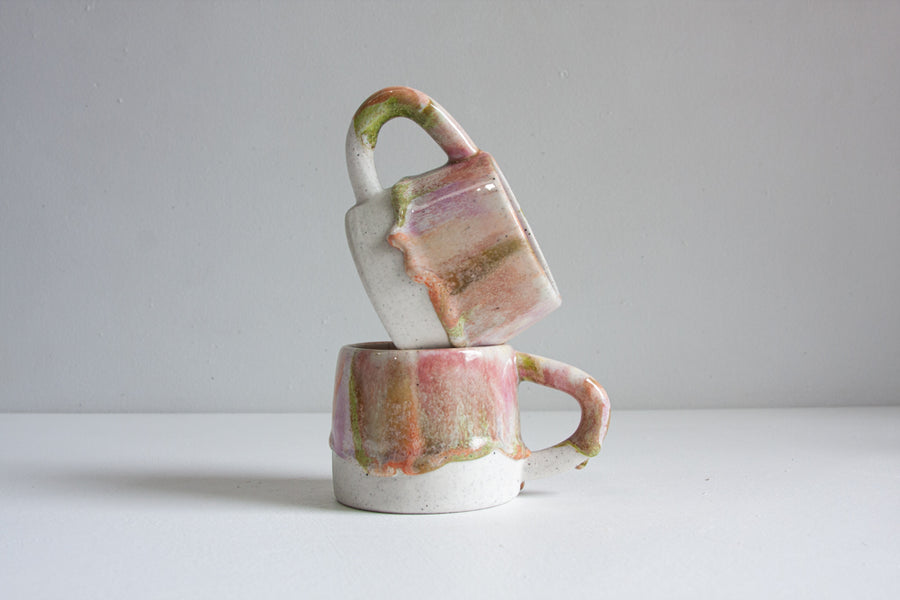 handmade ceramic green, pink and peach mug