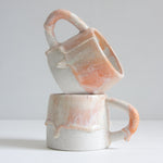handmade ceramic soft pink and cream mug