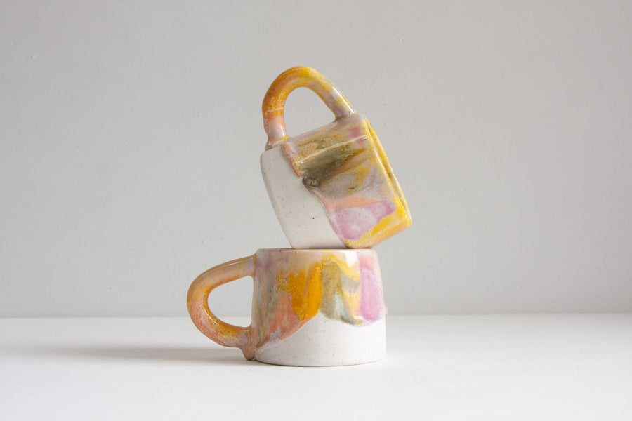 handmade ceramic purple, peach, yellow and blue mug