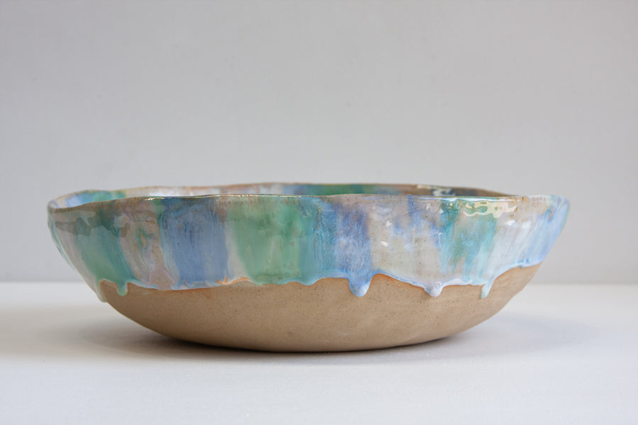 Handmade ceramic large fruit bowl glazed in blue, green and peach