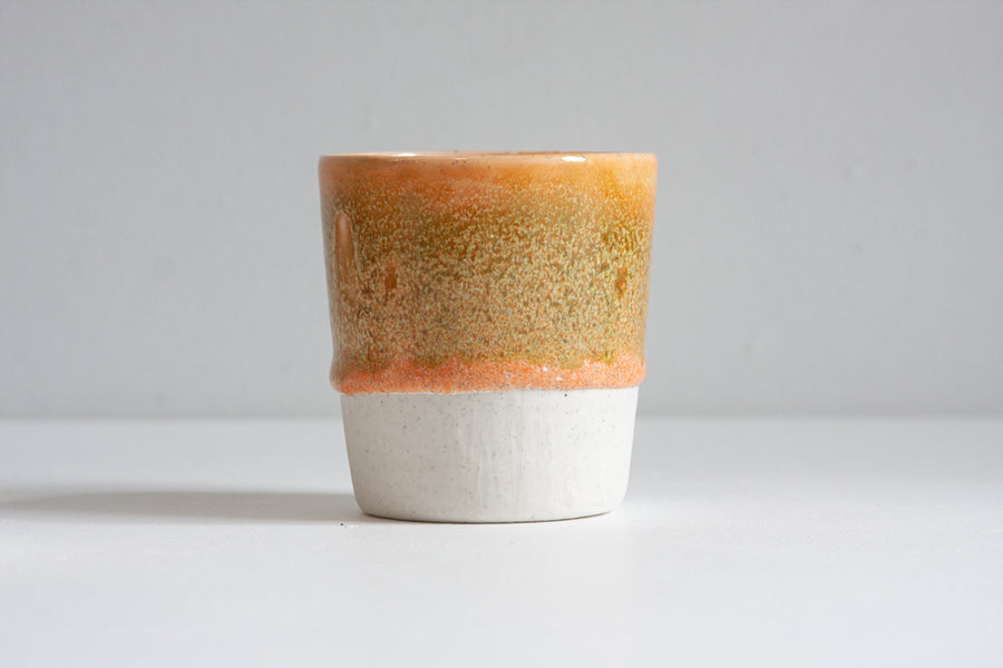 handmade ceramic green and peach tumbler