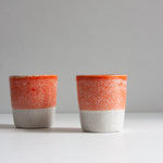 handmade ceramic orange tumbler cup
