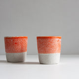 handmade ceramic orange tumbler cup
