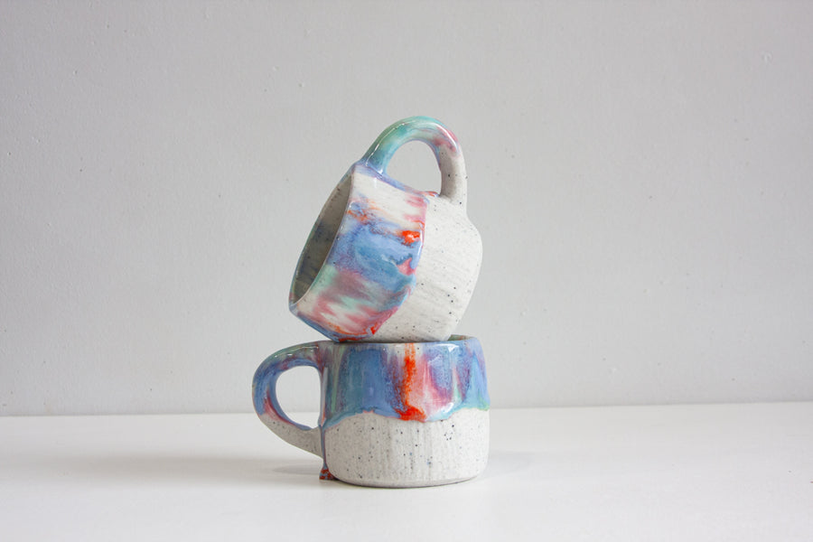 handmade ceramic pink, orange and blue mug
