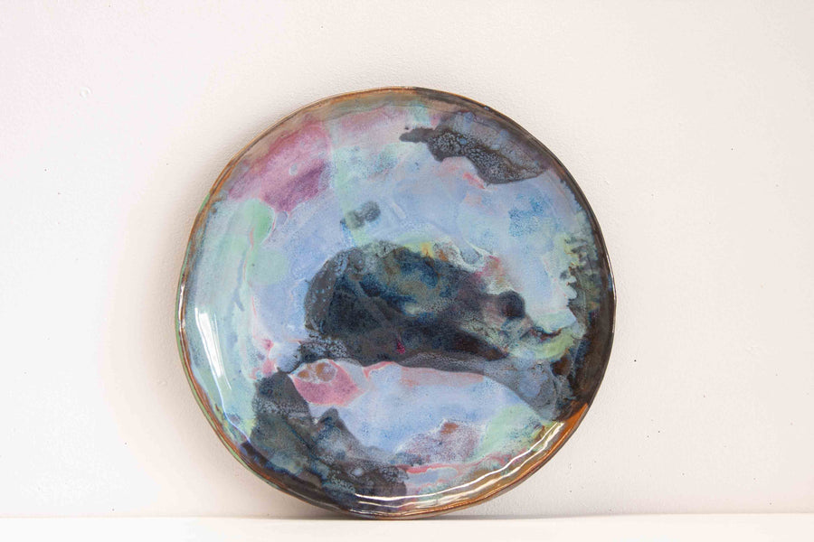 handmade ceramic black clay platter glazed in pinks, blues and greens
