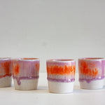 handmade ceramic espresso cup glazed in lilac and orange
