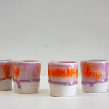 handmade ceramic espresso cup glazed in lilac and orange
