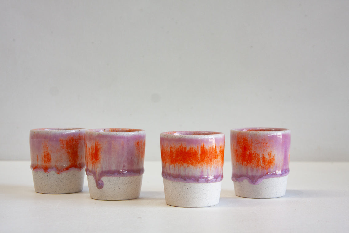 handmade ceramic espresso cup glazed in lilac and orange