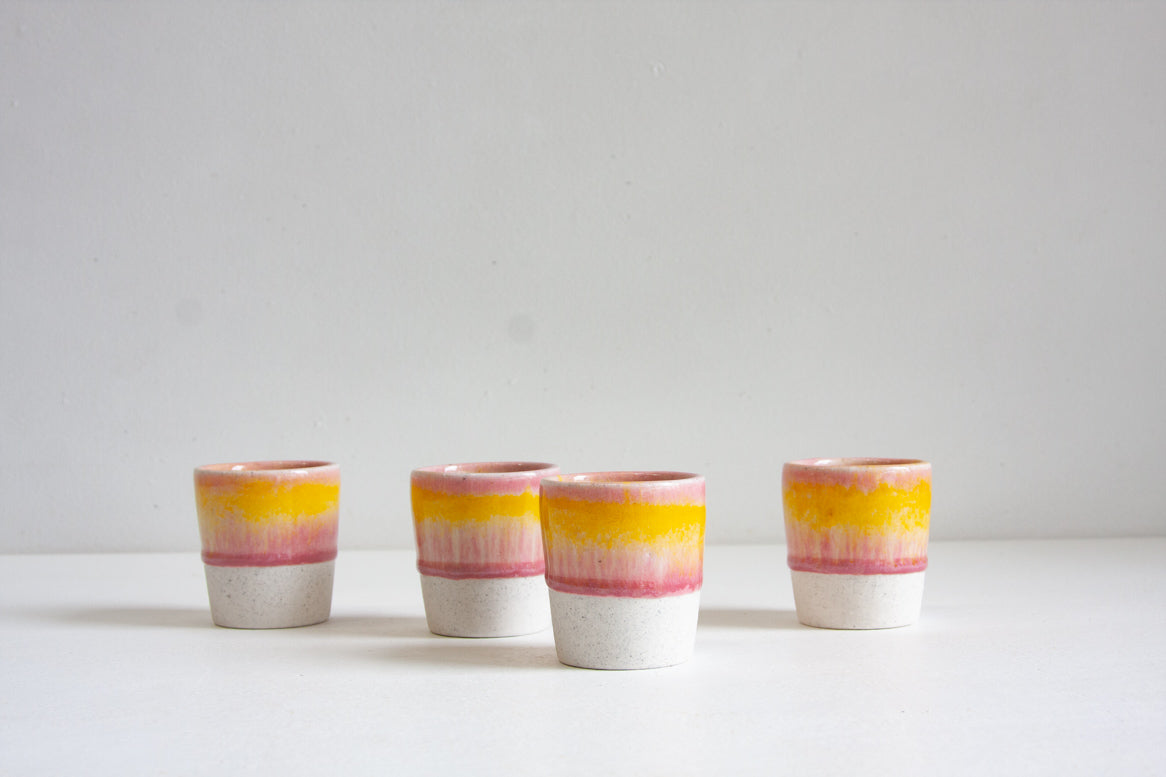 handmade ceramic espresso cup glazed in yellow and pink