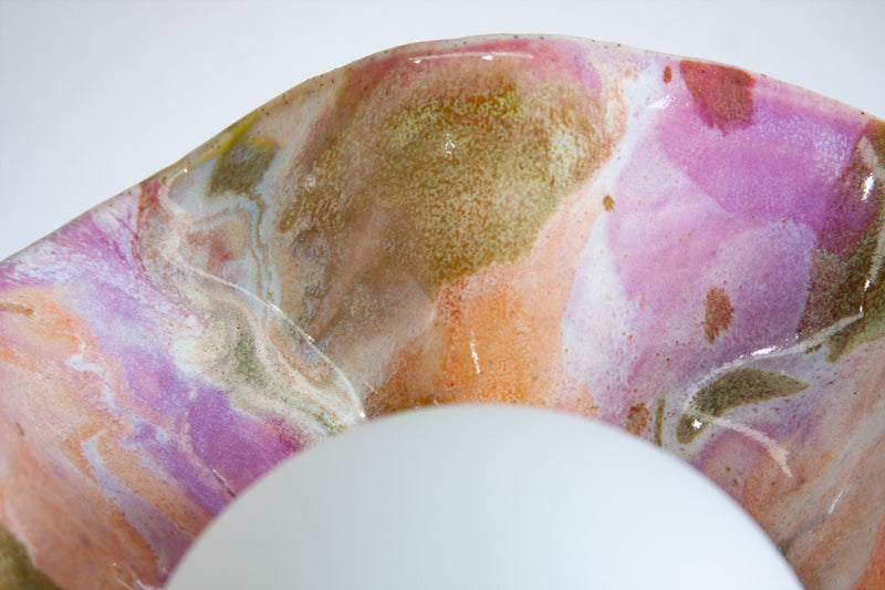 Finished ceramic table lamp glowing warmly