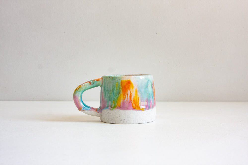 handmade ceramic purple, green, orange and yellow mug 
