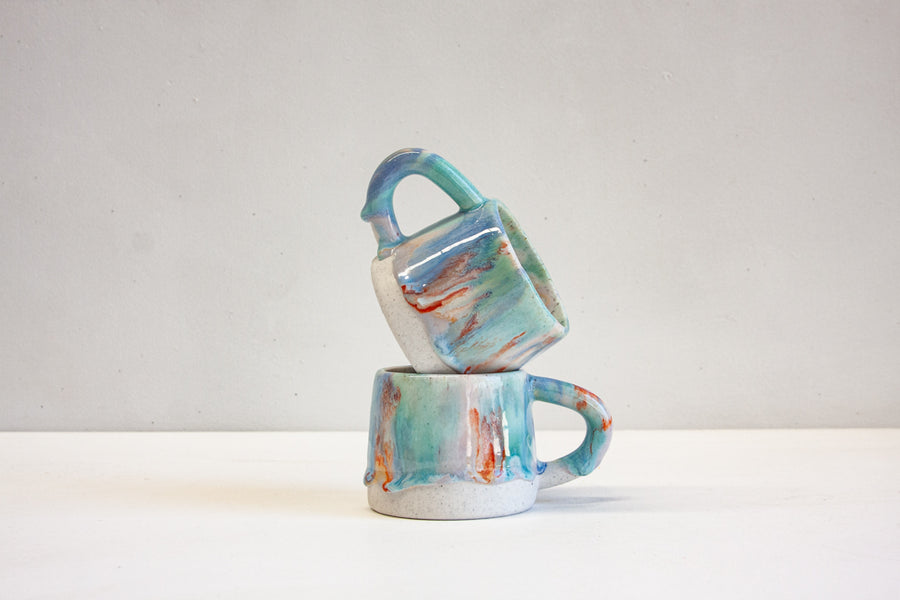 handmade ceramic blue, green, orange light purple mug