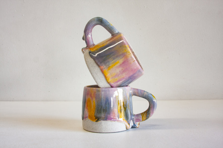 handmade ceramic purple, yellow and blue mug