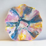 handmade ceramic sculptural oyster bowl glazed in purple, yellow, peach and blue