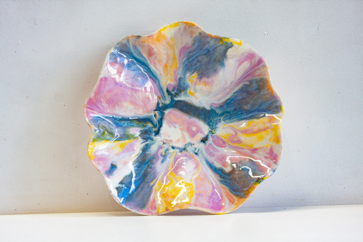 handmade ceramic sculptural oyster bowl glazed in purple, yellow, peach and blue