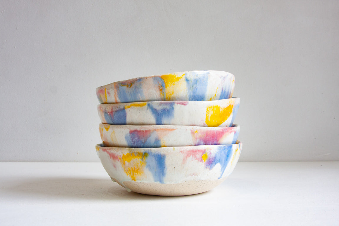 handmade ceramic pasta bowl, glazed in yellow, blue, peach and yellow