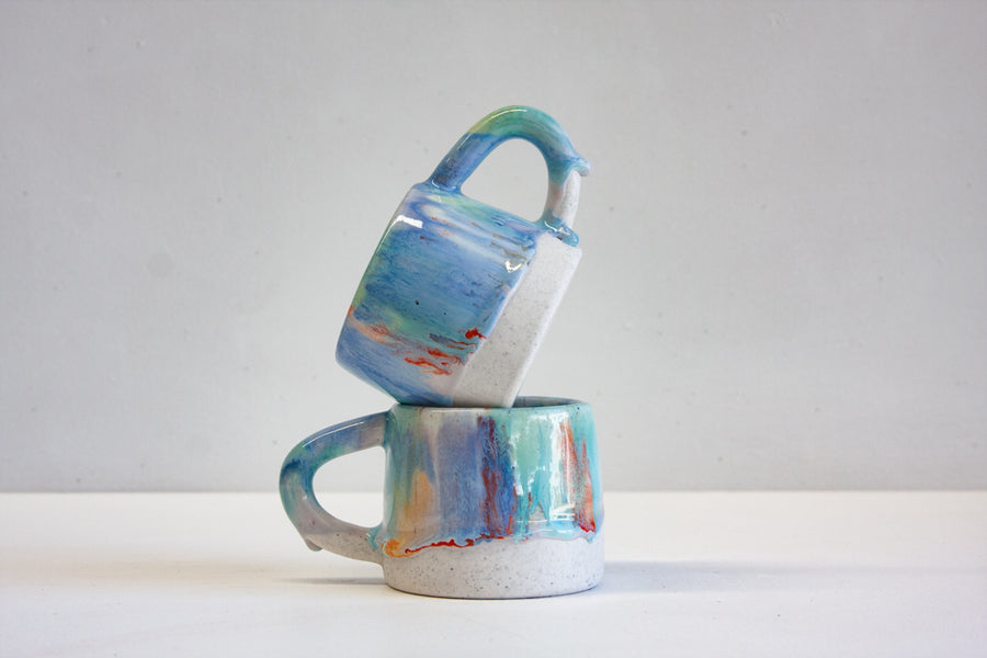 handmade ceramic seconds green, blue and orange mug 
