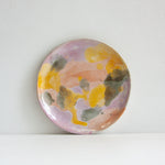 handmade ceramic purple, peach, yellow and blue side plate