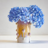 handmade ceramic bauble vase glazed in yellow and purple cylinder vase