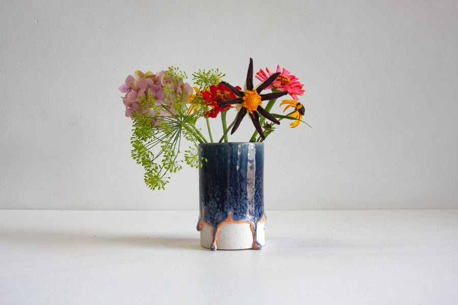 handmade ceramic small cylinder vase glazed in dark blue and peach