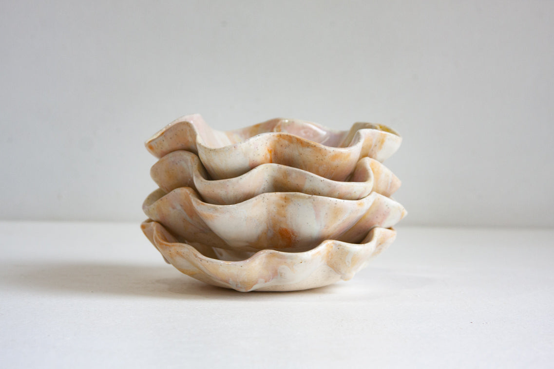 Handmade ceramic oyster shaped soft pink, cream bowl