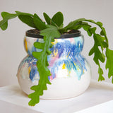 handmade ceramic planter glazed in blue, yellow, green