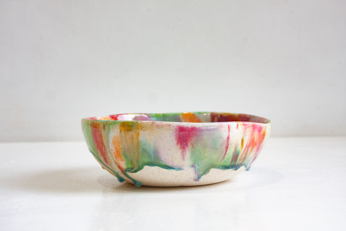handmade ceramic pasta bowl glazed in dark pink, purple, green, peach and brown