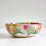handmade ceramic pasta bowl glazed in dark pink, purple, green, peach and brown