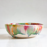 handmade ceramic pasta bowl glazed in dark pink, purple, green, peach and brown