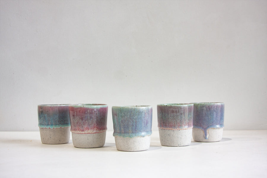 handmade ceramic blue an purplish pink tumbler cup
