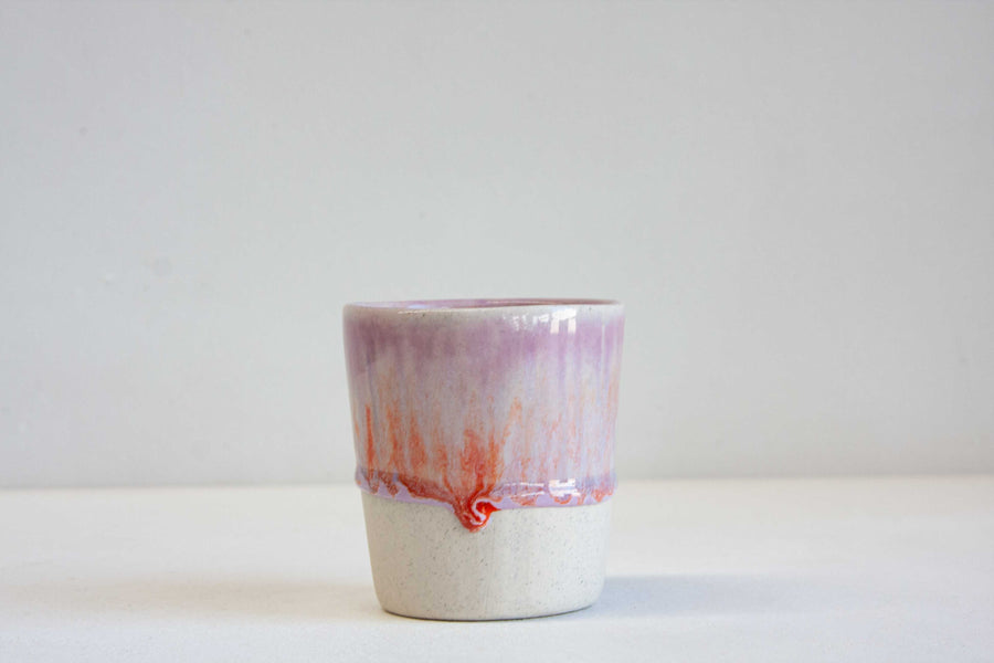 handmade ceramic purple and orange tumbler cup