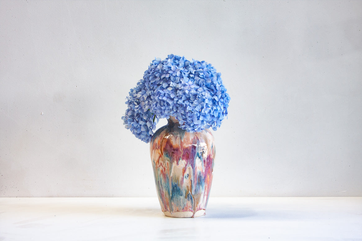 handmade ceramic vase glazed in pink, brown, peach and blue