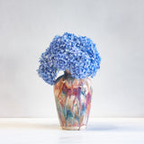 handmade ceramic vase glazed in pink, brown, peach and blue