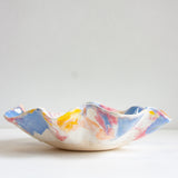 Handmade ceramic pink, peach, yellow, blue and white oyster shaped platter