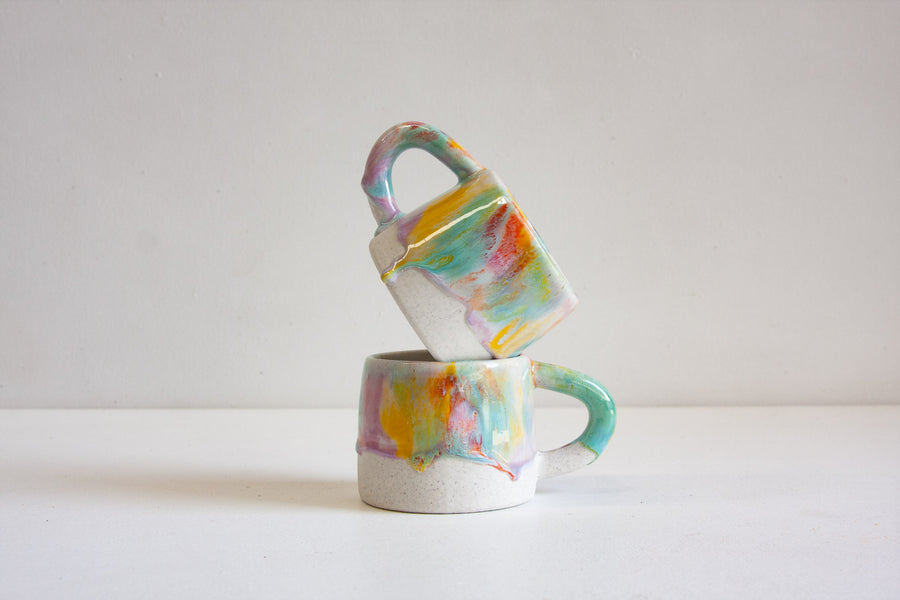 handmade ceramic green, orange, yellow and purple mug