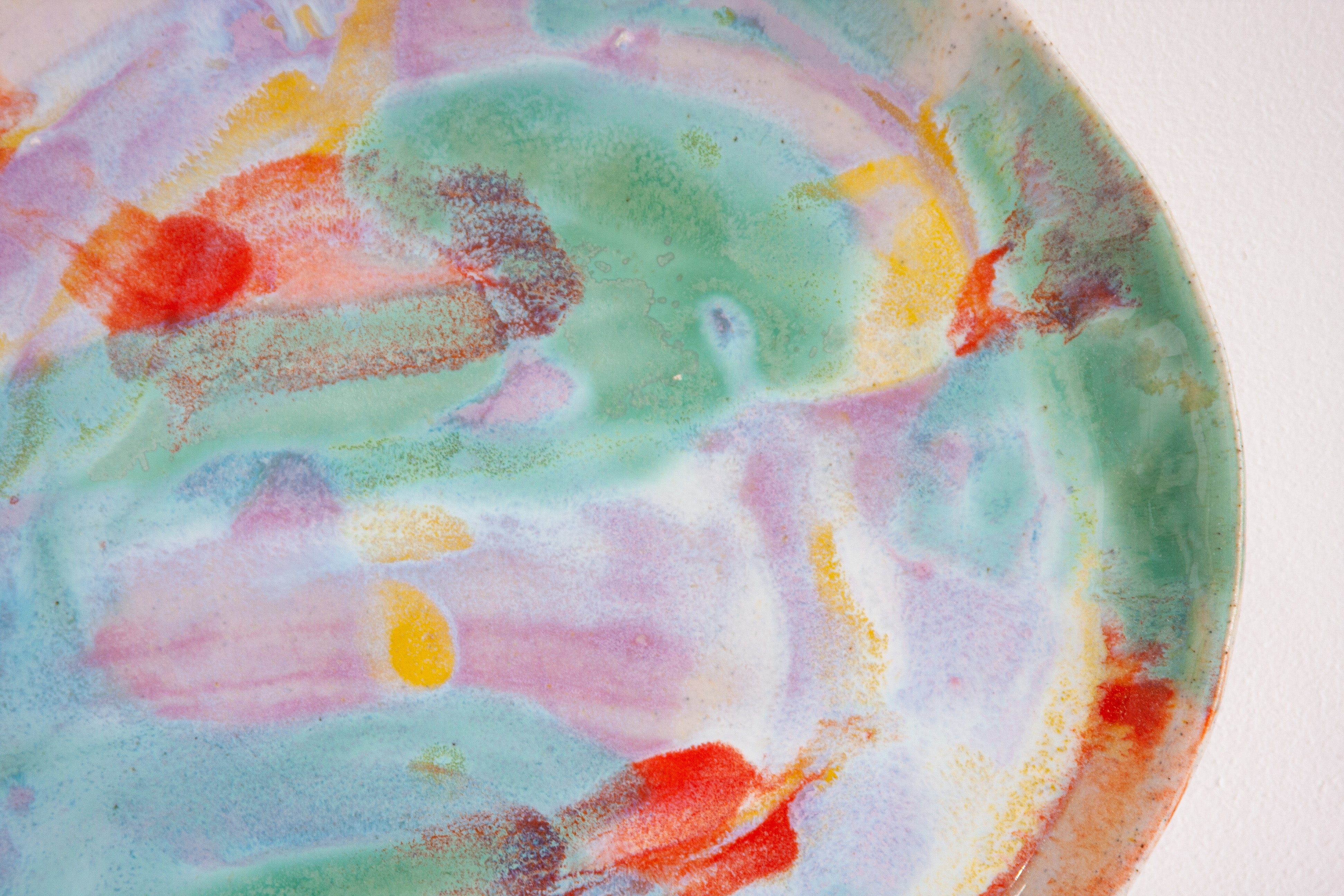 Colorful abstract painting with watercolor textures on a white background