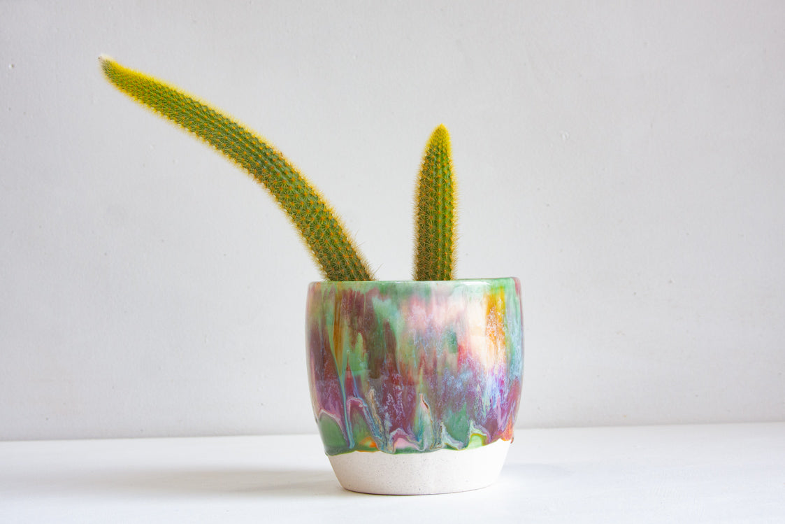 handmade ceramic planter glazed in pink, green, peach, brown