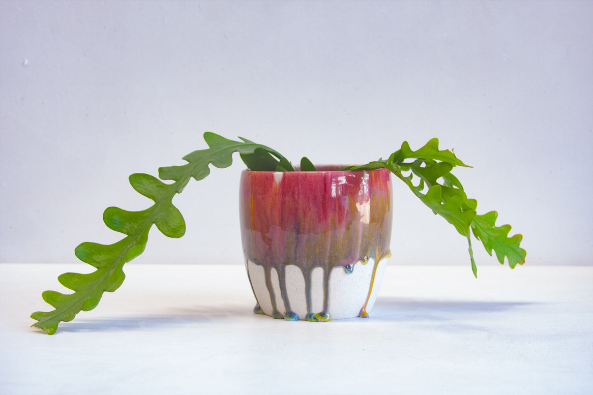 handmade ceramic pink, yellow and blue planter