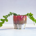 handmade ceramic pink, yellow and blue planter