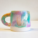 zoomed in handmade ceramic purple, green and peach large mug