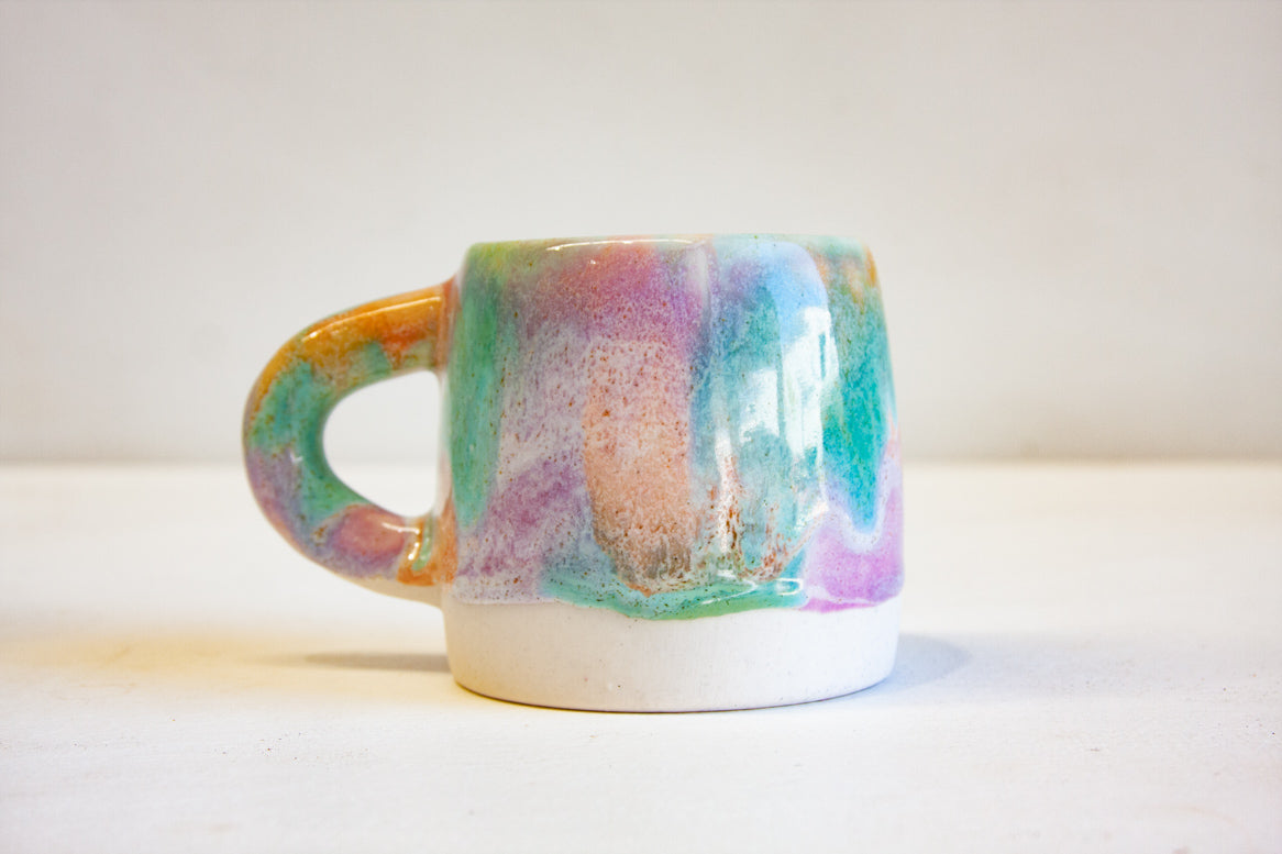 zoomed in handmade ceramic purple, green and peach large mug
