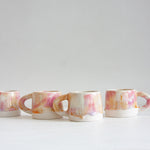 handmade ceramic pink, peach and white mug
