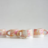 handmade ceramic pink, peach and white mug
