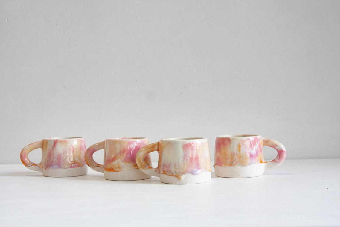 handmade ceramic pink, peach and white mug
